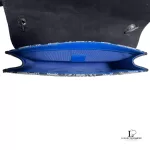 Furla wallet on chain opened to reveal vivid blue interior lining