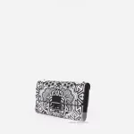 Furla black and white printed leather wallet on chain, studio view