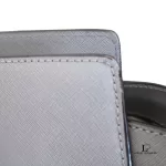 Michael Kors Selma grey Saffiano satchel, close-up of Saffiano leather texture