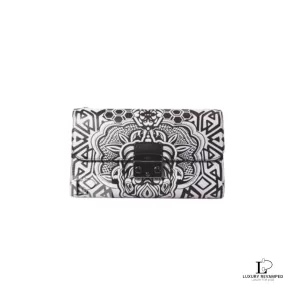 Furla wallet on chain in black and white graphic-print leather with dark push-lock, front view