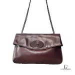 Coach maroon leather chain sling bag, with the chain strap hanging