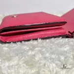 Tory Burch coral pink leather clutch with gold-tone chain, stacked compartments