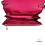 Tory Burch coral pink leather clutch with gold-tone chain, interior compartments and card slots