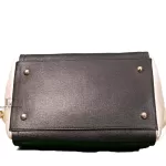 Furla tri-colour two-way handbag in black, white and maroon, base with protective studs