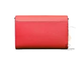Tory Burch coral pink leather clutch with gold-tone chain, back studio view