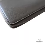 Celine taupe leather long zip-around wallet, close-up of grained leather and zip edge