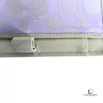 Coach lavender signature monogram billfold wallet, edge and interior detail
