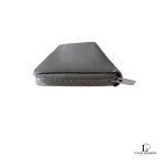 Celine taupe leather long zip-around wallet, slim side profile with zip