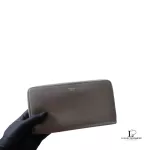 Celine taupe leather long zip-around wallet, angled view