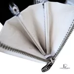 Marc by Marc Jacobs white leather zip-around long wallet, zip opened to show the compartments