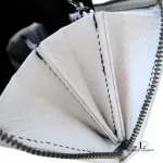 Marc by Marc Jacobs white leather zip-around long wallet, zip opened to show the compartments