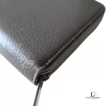 Celine taupe leather long zip-around wallet, close-up of grained leather and zip edge