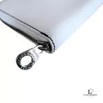 Marc by Marc Jacobs white leather zip-around long wallet, close-up of white leather and zip