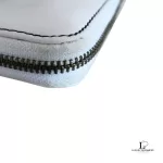 Marc by Marc Jacobs white leather zip-around long wallet, close-up of zip edge