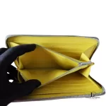 Celine taupe leather long zip-around wallet, opened to show interior compartments
