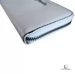 Marc by Marc Jacobs white leather zip-around long wallet, close-up of white leather and zip