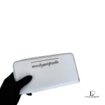 Marc by Marc Jacobs white leather zip-around long wallet, held in hand