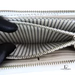 Marc by Marc Jacobs white leather zip-around long wallet, striped interior lining and card slots