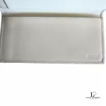 Coach lavender signature monogram billfold wallet, opened to show the inner compartments