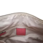 Coach Kristin signature hobo bag with salmon pink leather trim, interior lining