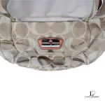 Coach Kristin signature hobo bag with salmon pink leather trim, top view with zip