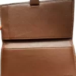 Coach brown signature monogram bifold wallet, leather back and edge