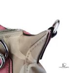 Coach Kristin signature hobo bag with salmon pink leather trim, handle attachment and side detail