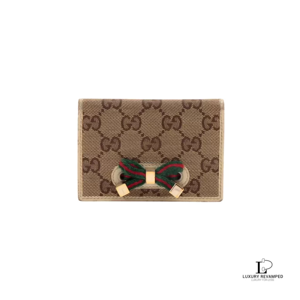 Pre-loved Gucci Sherryline beige monogram bifold card wallet, front view – secondhand designer, NZ