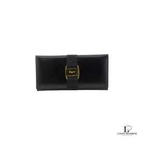 Pre-loved Salvatore Ferragamo Vara bow black leather long wallet, front view – secondhand designer, NZ