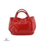 Pre-loved Kate Spade red patent leather enamel handbag, front view – secondhand designer, NZ