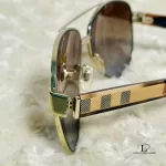 Burberry aviator sunglasses with gold frame and brown lenses, view 5