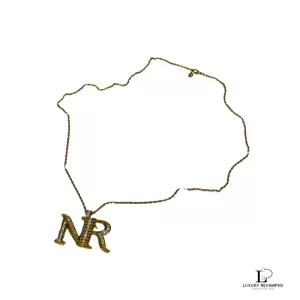 Pre-loved Nina Ricci NR initials gold necklace with gems, front view – secondhand designer, NZ