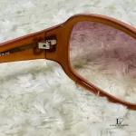 Dolce & Gabbana DG914S translucent pinkish brown sunglasses, view 6