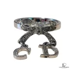 Christian Dior CD initials bow silver ring, size 5, view 2