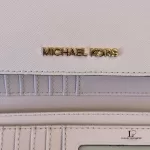 Michael Kors blush pink Saffiano leather flap long wallet, view 14