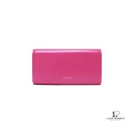 Pre-loved Yves Saint Laurent fuchsia pink smooth leather flap-closed long wallet, front view – secondhand designer, NZ