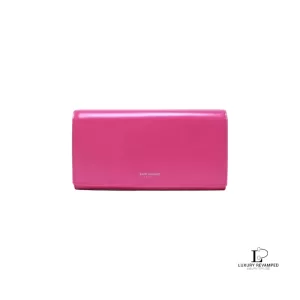 Pre-loved Yves Saint Laurent fuchsia pink smooth leather flap-closed long wallet, front view – secondhand designer, NZ