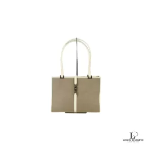 Pre-loved Gucci Jacqui-O beige and creme canvas handbag, front view – secondhand designer, NZ