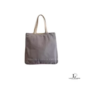 Pre-loved Louis Vuitton Fondation Museum limited greyish mauve and beige canvas tote bag, front view – secondhand designer, NZ