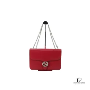 Pre-loved Gucci Dollar pinkish red polished calfskin Interlocking G chain shoulder bag, front view – secondhand designer, NZ