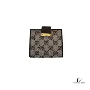 Pre-loved Gucci brown monogram canvas short bifold wallet, front view – secondhand designer, NZ