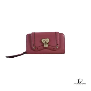 Pre-loved Anna Sui pink puce leather long zip wallet, front view – secondhand designer, NZ