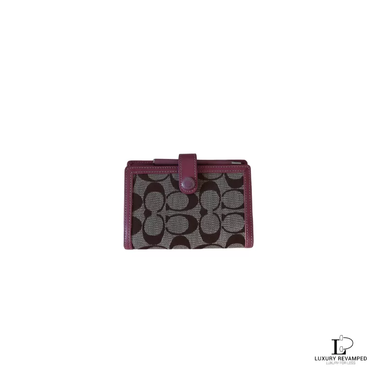 Pre-loved Coach old rose and brown monogram passport notebook holder, front view – secondhand designer, NZ
