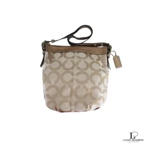 Pre-loved Coach brown and bronze monogram canvas crossbody bag, front view – secondhand designer, NZ
