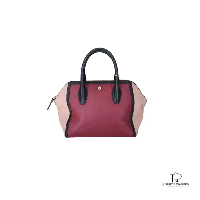 Pre-loved Furla tricolour black, maroon and peach leather handbag, front view – secondhand designer, NZ