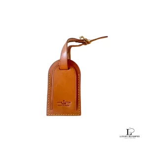 Pre-loved Louis Vuitton Vachetta leather luggage tag with gold-tone hardware, front view – secondhand designer, NZ