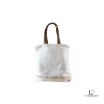 Pre-loved Louis Vuitton Fondation Museum Paris exclusive limited white and brown canvas tote bag, front view – secondhand designer, NZ