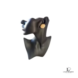 Pre-loved Christian Dior chunky patterned gold-tone clip-on earrings, front view – secondhand designer, NZ