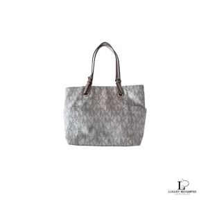Pre-loved Michael Kors signature logo white and beige large East-West tote bag, front view – secondhand designer, NZ