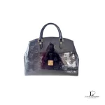 Pre-loved MCM black embossed patent leather structured career bag, front view – secondhand designer, NZ